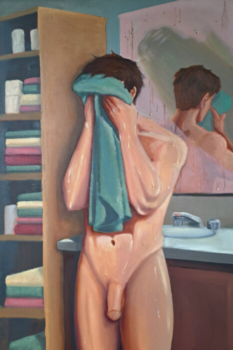 This image is of a man drying himself off after a shower, his reflection in the mirror behind him.